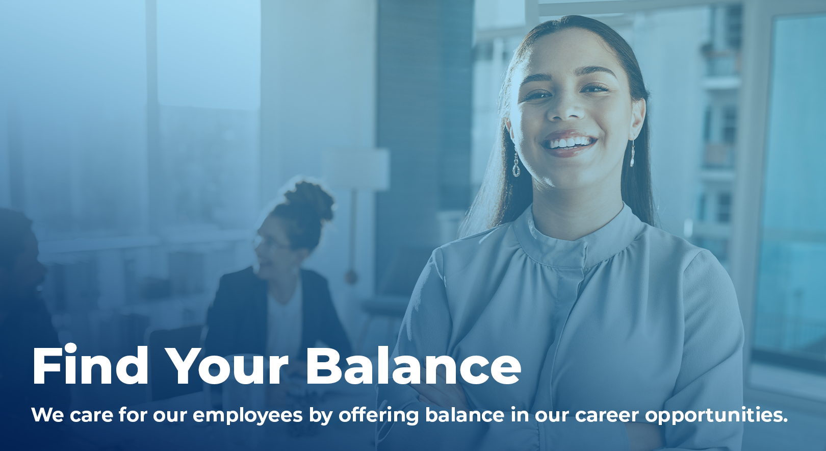 smiling person in an office, with more people in the background, overlaid with text "Find Your Balance: We care for our employees by offering balance in our career opportunities."