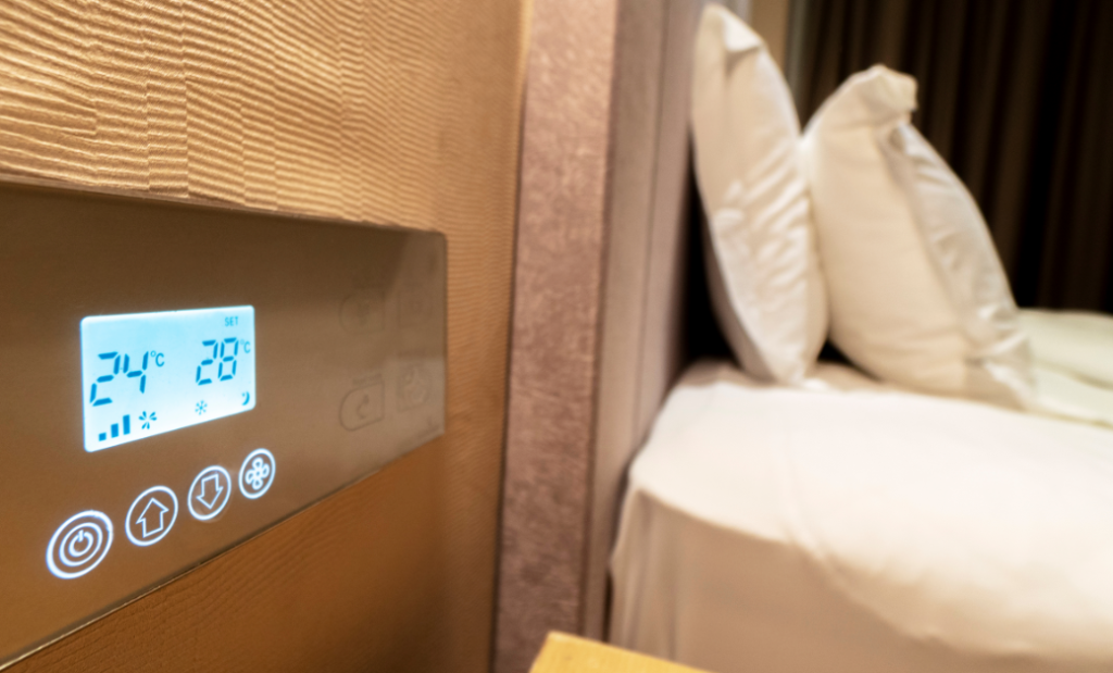 example of sustainable technology- a smart thermostat in a hotel room